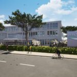 Moderne Bürogebäude der Harzwasserwerke mit begrüntem Vorplatz an einem sonnigen Tag.